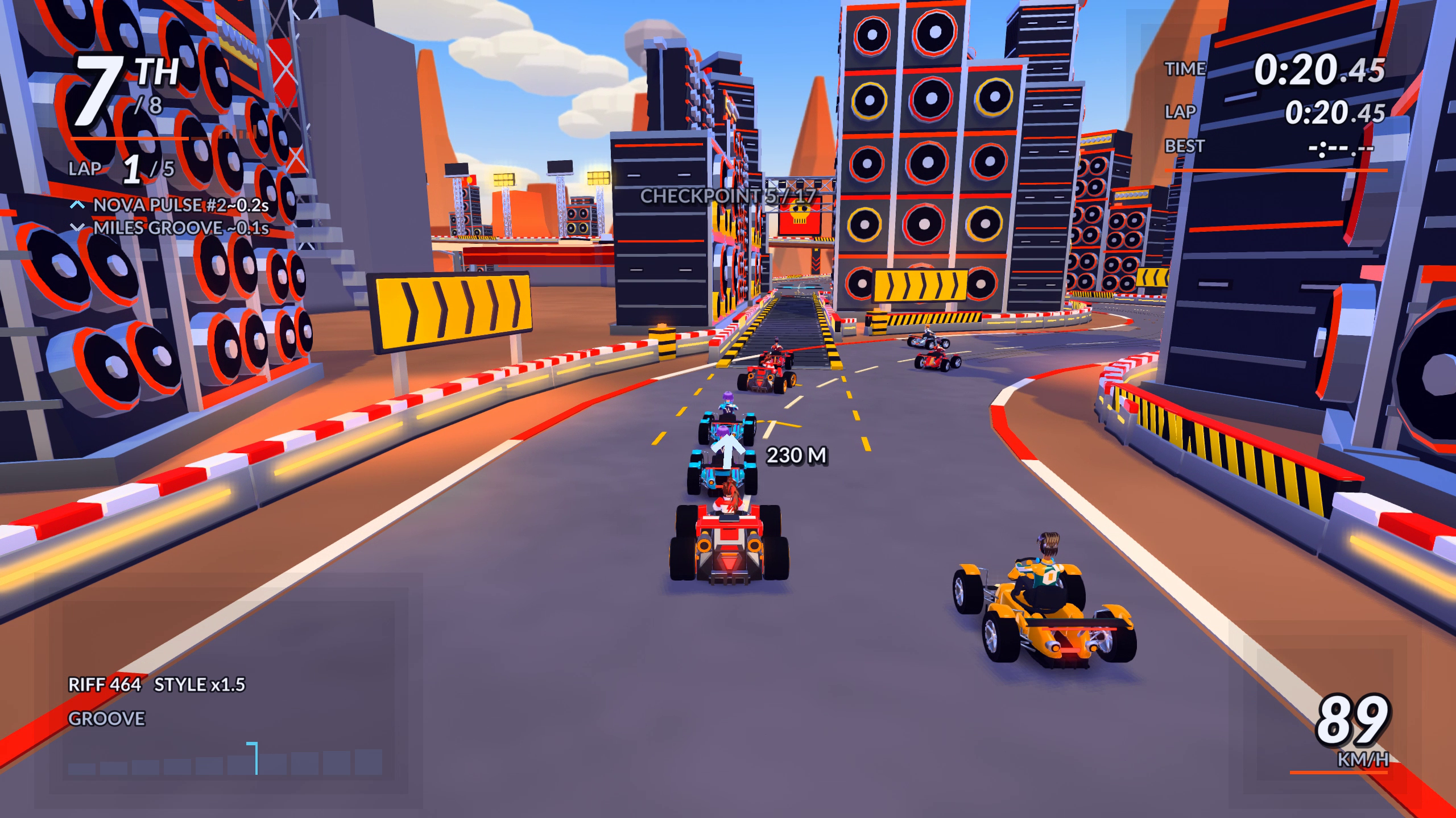 A kart racing through the rebuilt Amp Canyon section of Iron Chorus, with towering speaker and amplifier structures on both sides of the road.