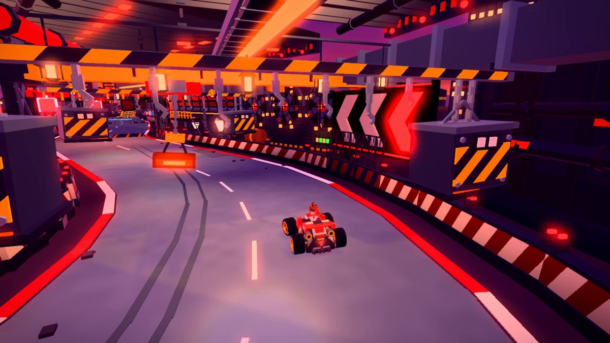 A kart turning through the Core Pit between industrial machines and suspended hazard arms above the racing line.